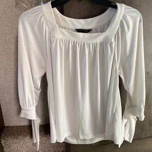 Banana Republic off-white top.